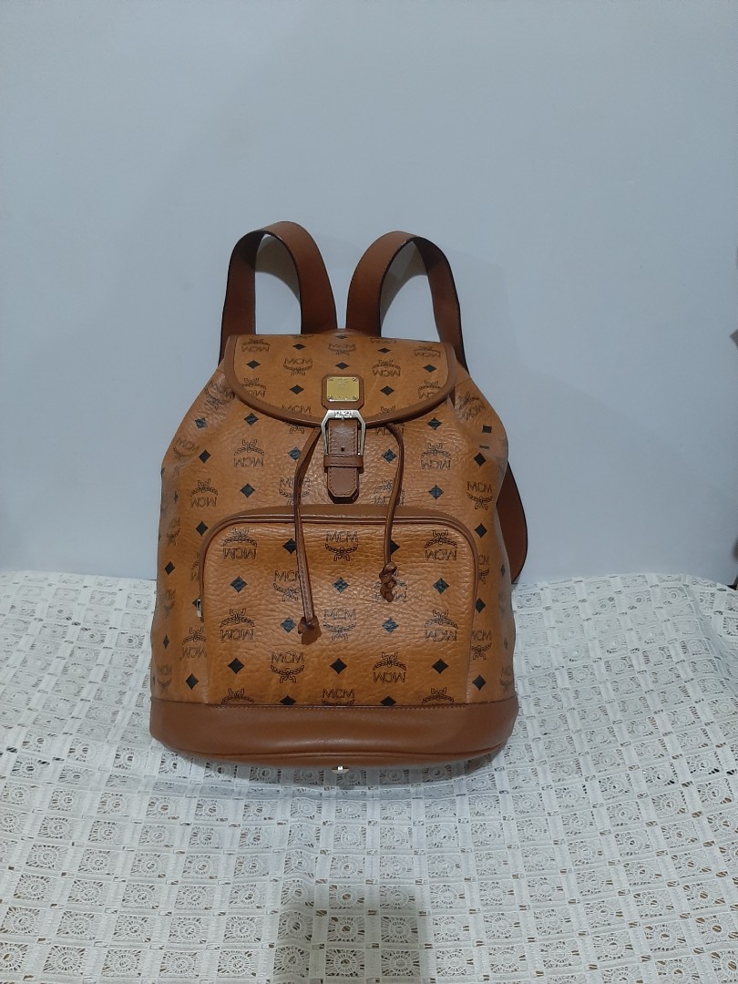 Legit MCM backpack turnable screws, Luxury, Bags & Wallets on Carousell