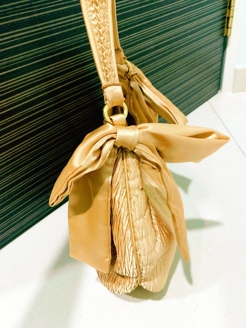 Gold store satin bag