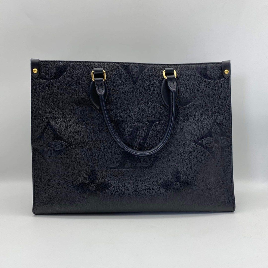 Louis Vuitton On The Go MM Bicolor Black and White, Luxury, Bags & Wallets  on Carousell