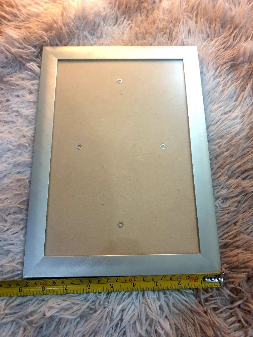 SILVER METAL FRAME (Category: Frames & Pictures) located in Pasig City. Submitted by hoa_japan_surplus_32023 (Listing ID 1251518531, Image 2). Description: SILVER METAL FRAME 250 php.