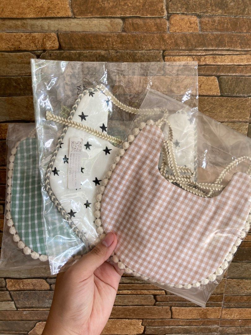 Stylish Reversible Bibs (Category: Breastfeeding & Bottle Feeding) located in Batangas. Submitted by marsell_2020 (Listing ID 1251480892, Image 1). Description: Take all for 300!! Rfs: Need to declutter.