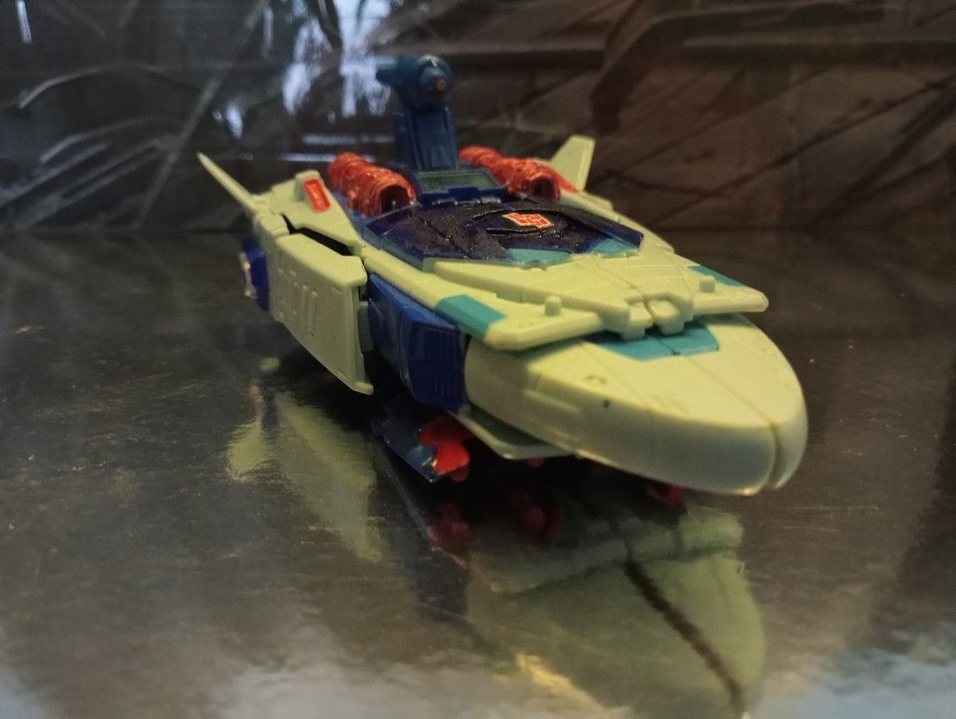 Transformers : Titans Return - Devcon (custom) (Category: Toy Figures) located in Singapore. Submitted by slammerisunless (Listing ID 1251624056, Image 2). Description: I'm about to sell this custom figure of Devcon because this was made back around 2020 as back when they still didn't redo the figure of our beloved Autobot Bounty Hunter, and now they did make the figure of Devcon as part of TF LEGACY. This figure of Devcon is basically what I use