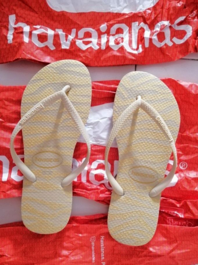 Gold and white flip clearance flops