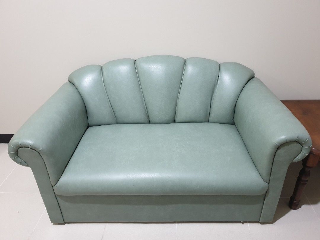 Blims Fine Furniture Sofa Set (Category: Sofas) located in Makati City. Submitted by fifth_avenue_shop_mnl (Listing ID 1251758027, Image 3). Description: 2 sets of 2 seater green leather sofa set with dark wood center/coffee table and side table. Dimensions: Sofa (b): 57.5" (54") L × 30.1" W × 30.5" H Sofa (s): 49.7" (47.7") L × 28.9" W × 20.9" H Coffee table: 42.5" L × 21.3" W × 15.9" H Side table: 24.5" L × 20.2" W × 18" H The payment of the pu