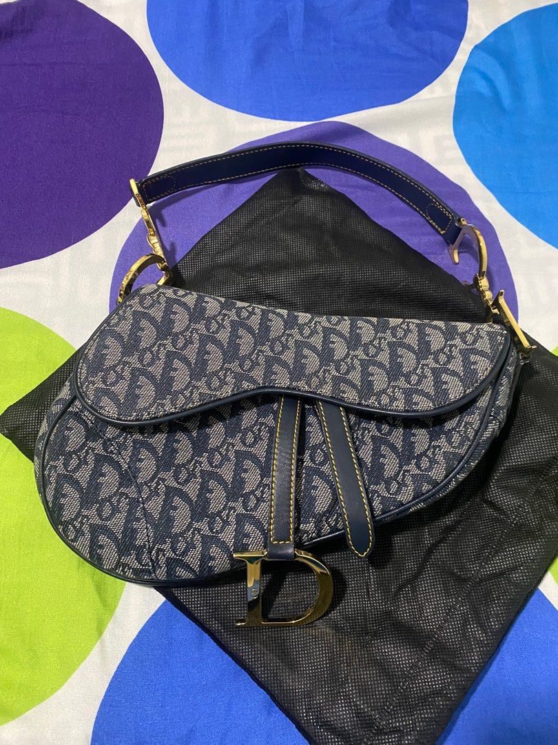 Dior saddle (Category: Luxury Bags & Wallets) located in Quezon City. Submitted by jujoo (Listing ID 1251762094, Image 3). Description: Medium With cards only Bought in 2006 at Seoul Duty Free Negotiable! .