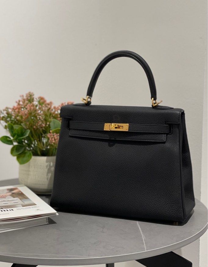 Kelly 25 black togo best sale