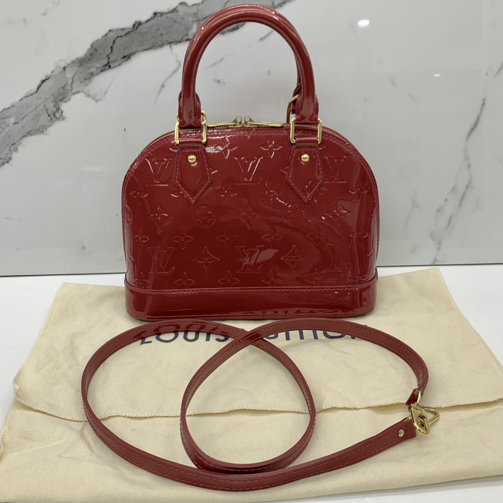 LOUIS VUITTON M91606 VERNIS RED ALMA BB POMDAMUL 2WAY SHOULDER BAG  237026488 KM, Luxury, Bags & Wallets on Carousell