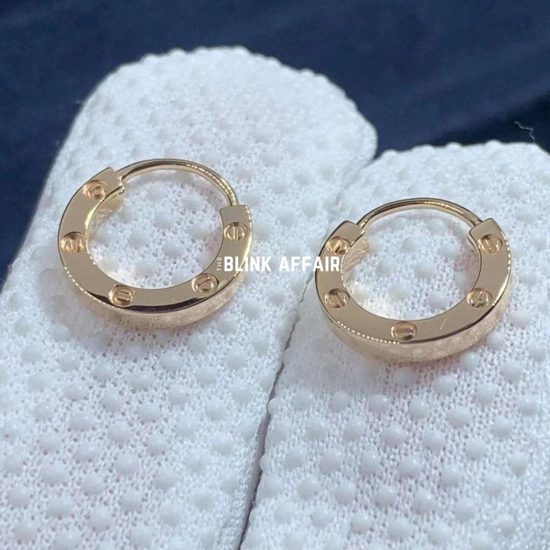 Gold love earrings on sale
