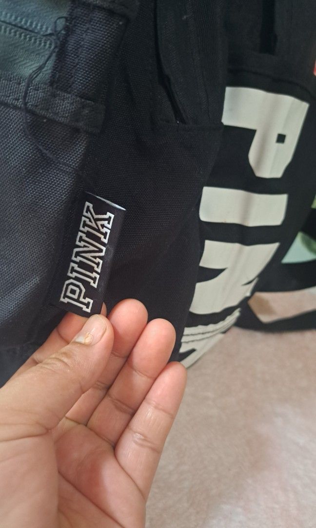 Pink brand backpack hotsell black