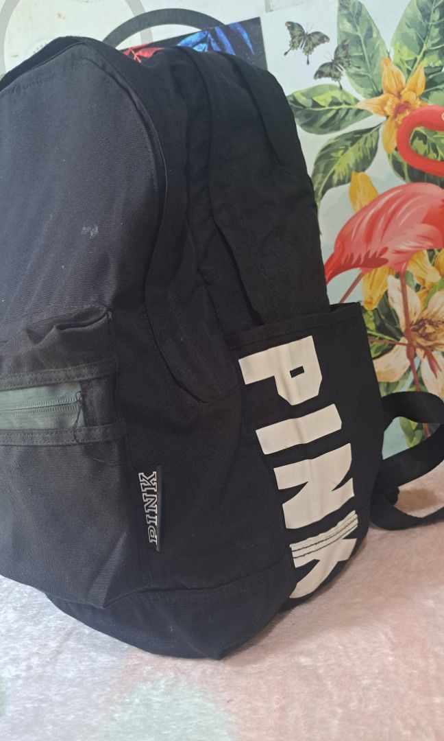 Pink brand hotsell black backpack