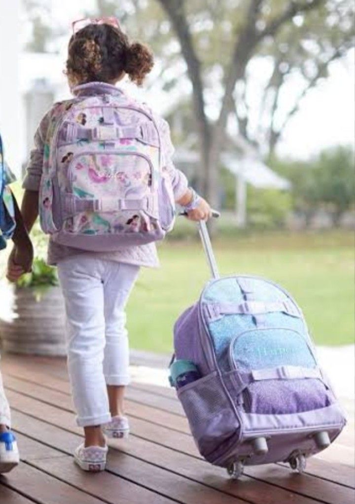 Mackenzie rolling backpack deals