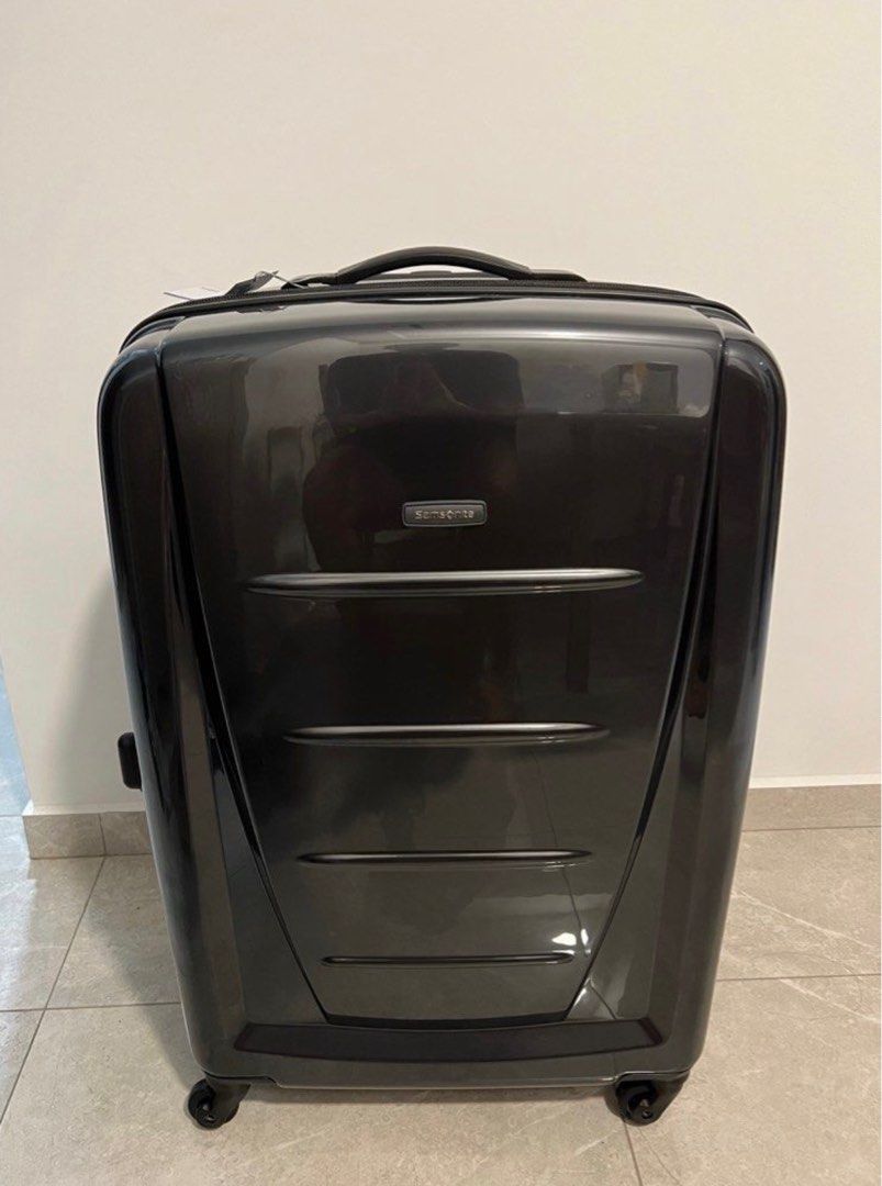 Samsonite sigma 76cm expandable hotsell spinner weight