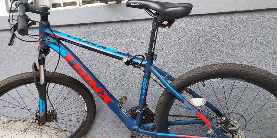 trinx mountain bike blue