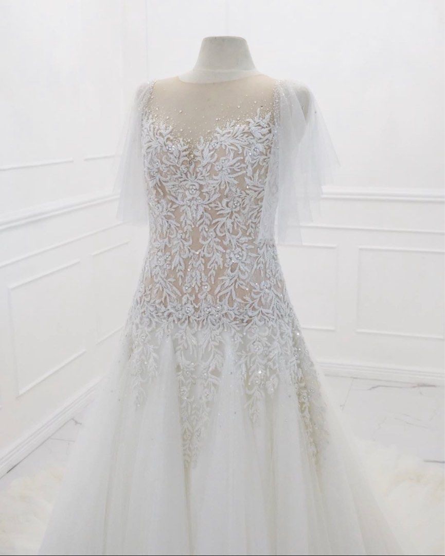 Wedding gown (Category: Evening dresses & gowns) located in Paranaque City. Submitted by jenchumann (Listing ID 1251688166, Image 3). Description: Custom made embroidered and embelishments by Ingrid Santillan Atelier for 75k. Dry cleaned already. .