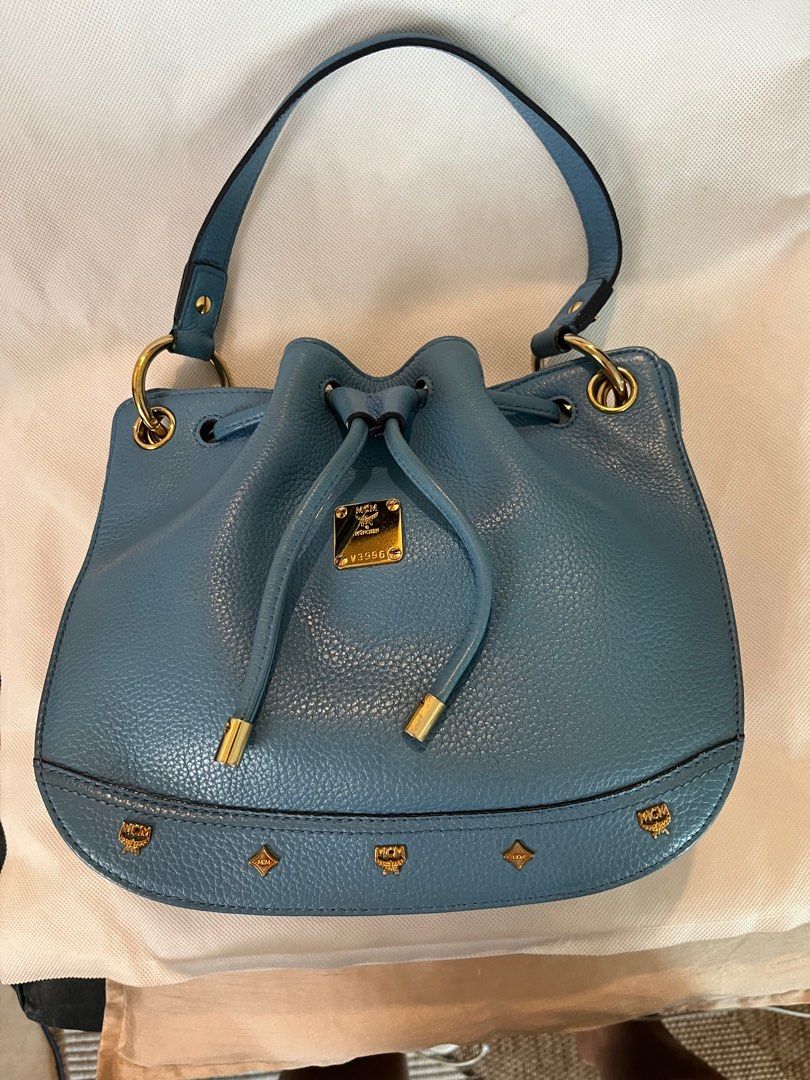 Authentic MCM Bucket bag (Category: Luxury Bags & Wallets) located in Makati City. Submitted by mintbags (Listing ID 1246828919, Image 3). Description: Check photos. In very good condition. No damage, no issue. With long strap and generic dustbag. .