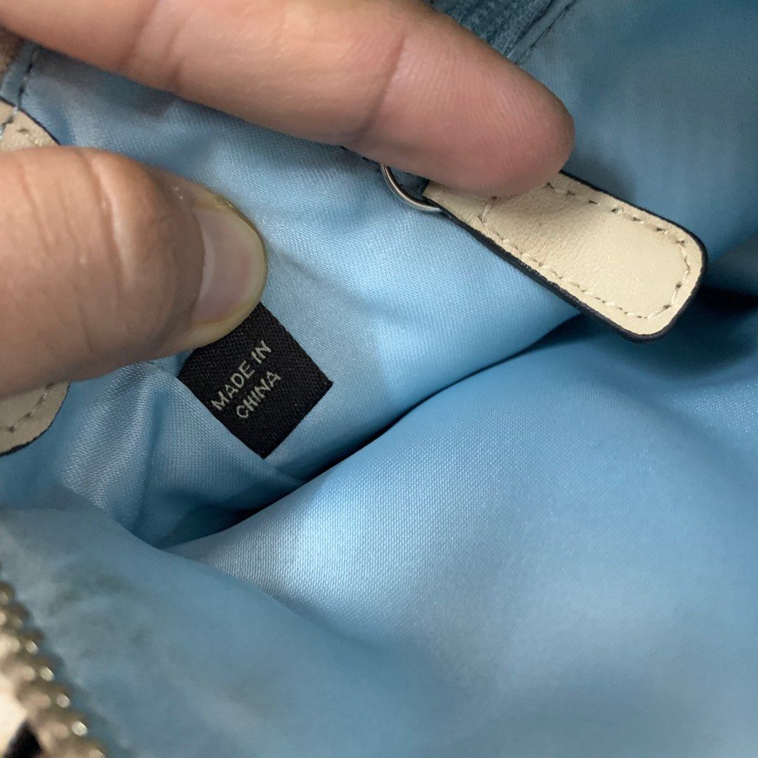 Coach made sale in china tag