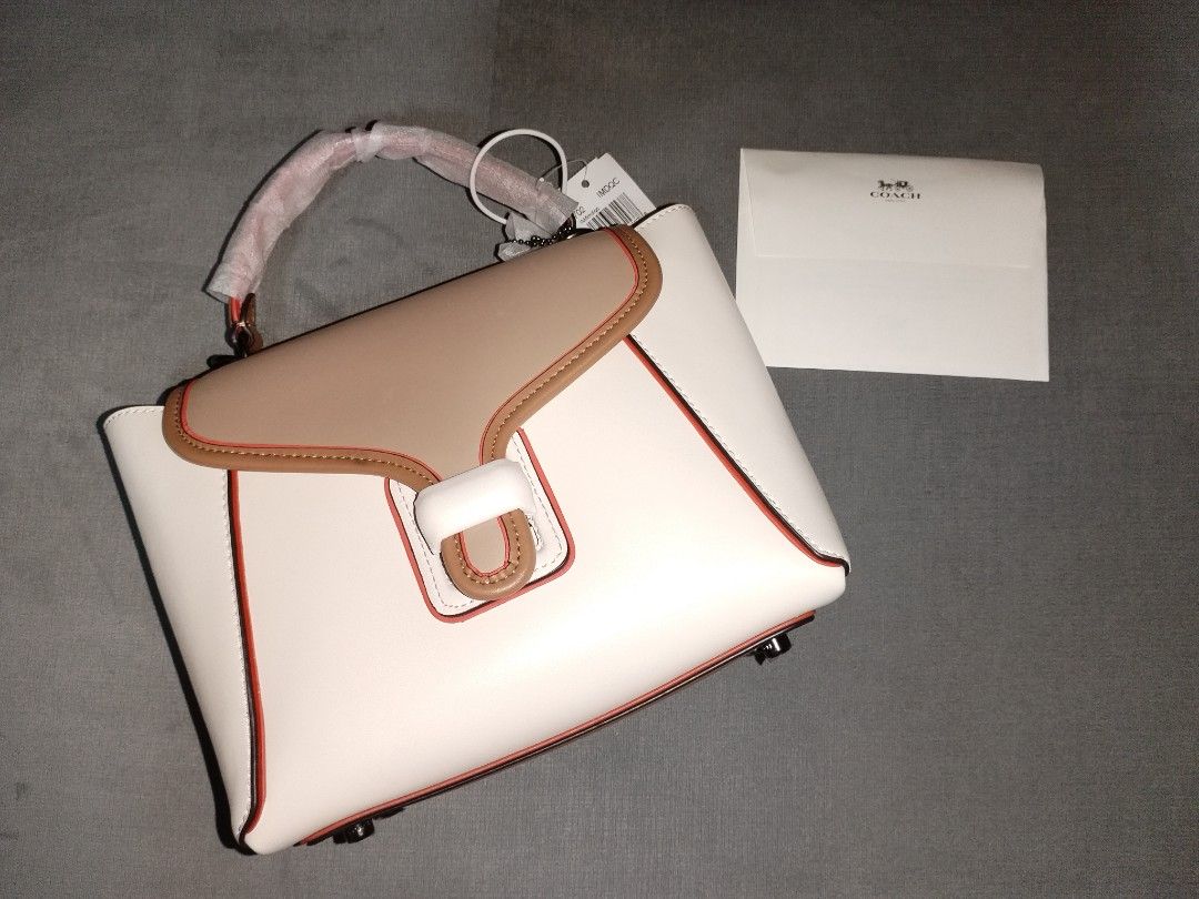Courier leather sales convertible bag coach