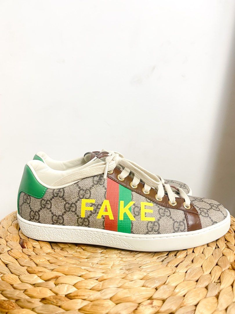 Not fake best sale gucci slippers