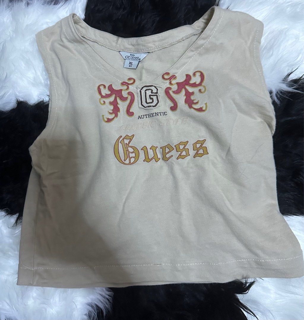 Guess croptop/baby top (Category: Sleeveless) located in Mexico. Submitted by declutterclosetph (Listing ID 1246875867, Image 1). Description: BABY GUESS XL FOR ADULT XXS-S (petite) SO CLASSY AND PRETTY! barely used.