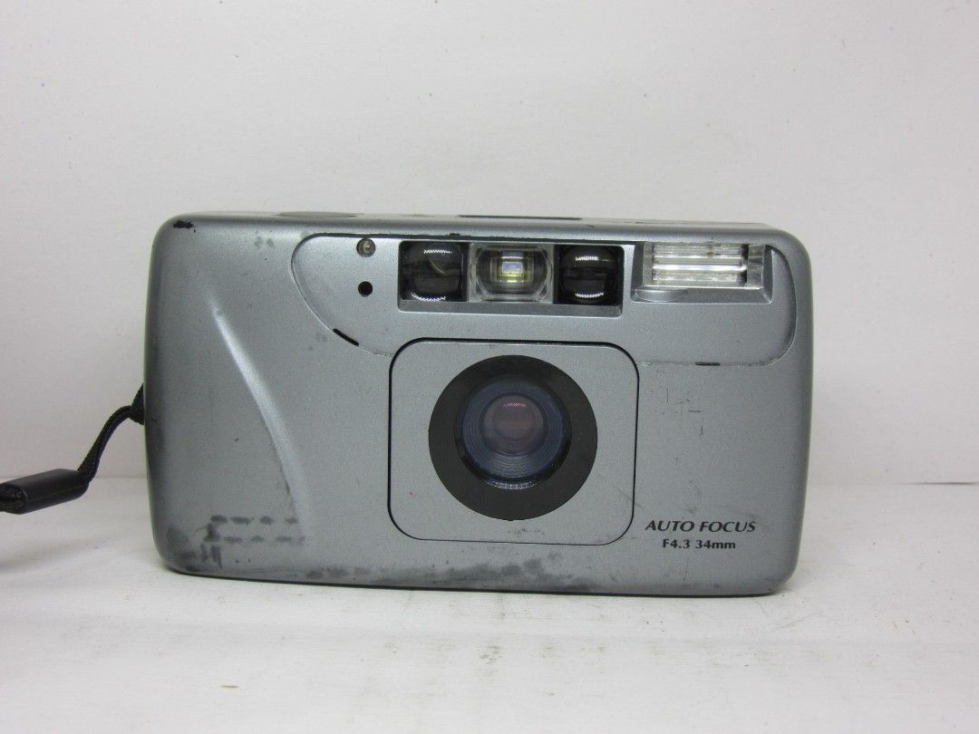 Mini compact 340 film camera (Category: Cameras) located in Las Pinas. Submitted by film101 (Listing ID 1246788501, Image 1). Description: ✨Mini Compact 340 FILM CAMERA ✨looks like konica big mini Inclusion :straps only ✨Run by cr123A x1 pc ✨CONDITION OF CAMERA 🔸meter working 🔸Shutter working 🔸Flash working 🔸Aperture snaps 🔸Viewfinder clean 🔸External protector glass missing(check pics) doesn't affect electronic condition Cosmetics cond. Che