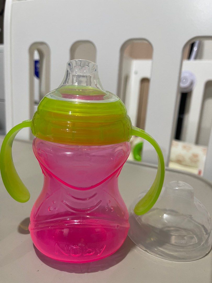 Nuby Training Sippy cup (Category: Weaning & Toddler Feeding) located in Quezon City. Submitted by mertrsl (Listing ID 1246919640, Image 2). Description: Washed but not used.