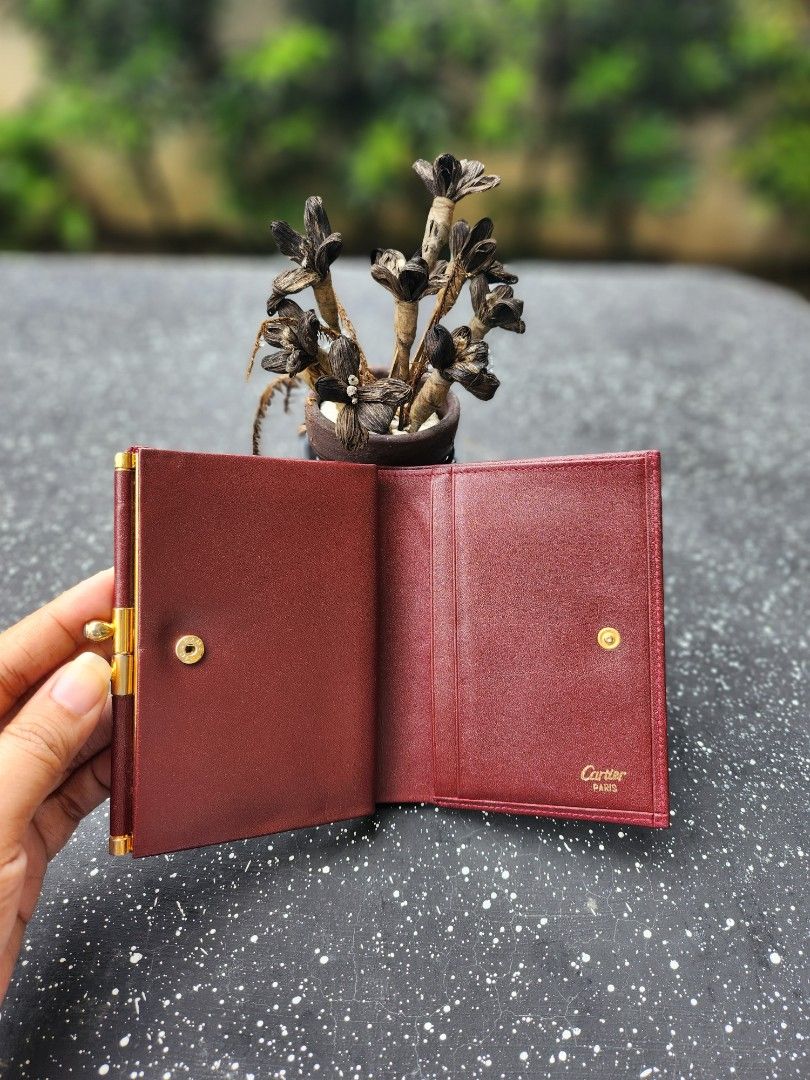 Original Cartier Medium Bifold with Kisslock (Category: Luxury Bags & Wallets) located in Cabanatuan. Submitted by meyrasol (Listing ID 1246799568, Image 2). Description: minimal coin residue.
