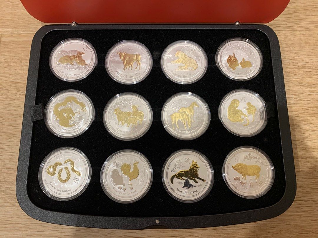 Perth Mint Series 2 Lunar Coin Set (Category: Currency) located in Singapore. Submitted by ahleo (Listing ID 1246752867, Image 1). Description: Perth Mint Series 2 Lunar Coin Set. 2008 to 2019, Original Gold Gilded 1 oz silver coin. 12 x 1 oz .999 silver coin with real Gold Gilded. Full set with original box from Perth Mint and all the COAs. Collected over 12 years. Very rare, I don’t see it selling on eBay or carousel. .
