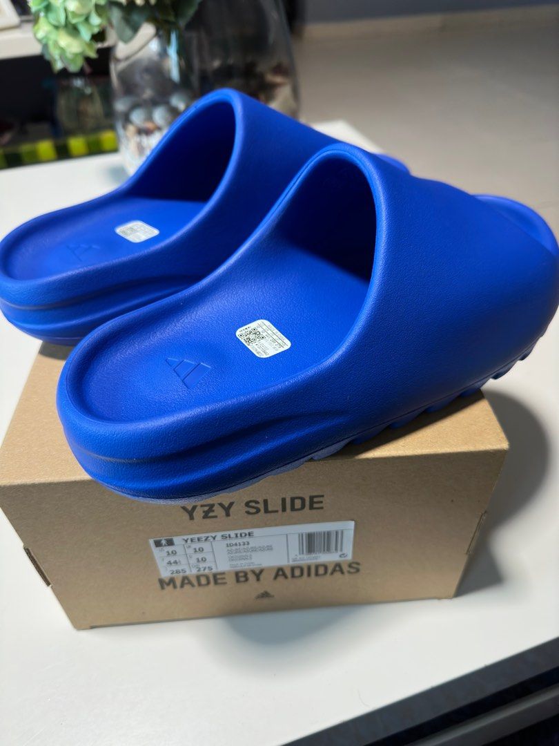 Yeezy slides azure, Men's Fashion, Footwear, Flipflops and Slides on