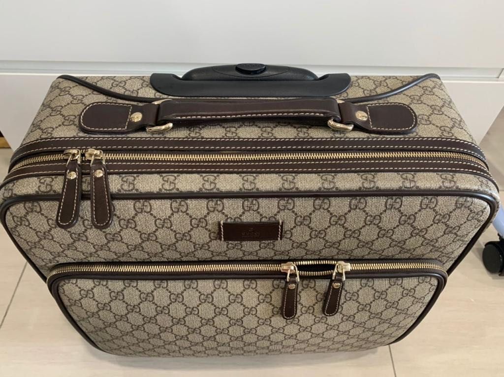 Gucci luggage deals bag price