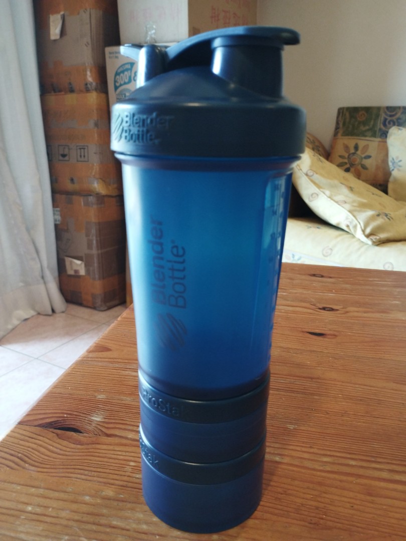 China Blender Bottle ProStak 22oz Protein Shaker Cup with storage