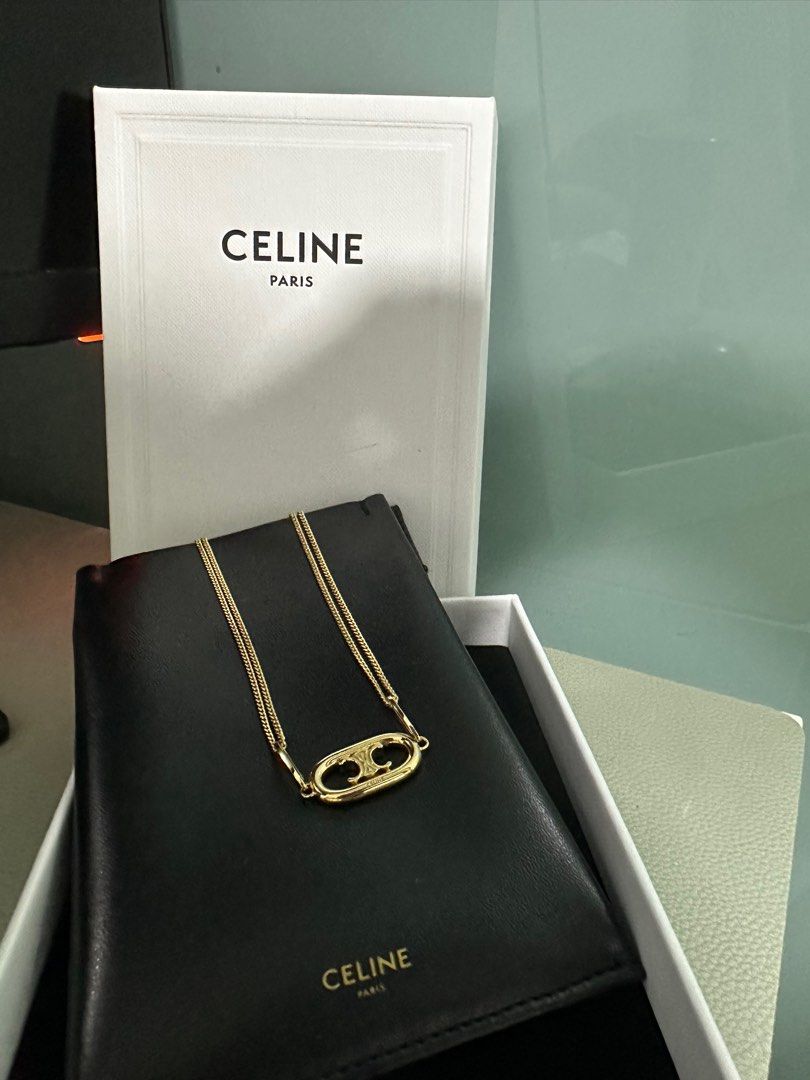 CELINE Triomphe TRIOMPHE ASYMMETRIC HOOPS IN BRASS WITH GOLD FINISH