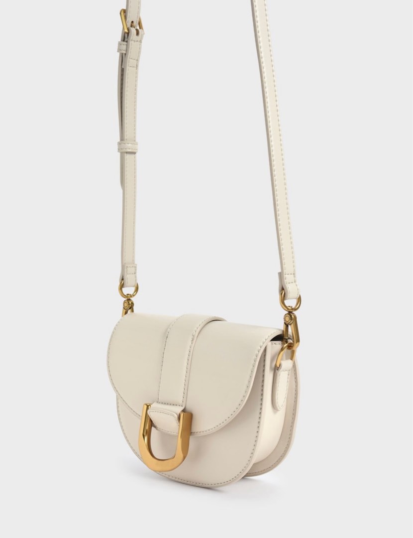 Charles and Keith Mini Gabine Saddle Bag, Women's Fashion, Bags