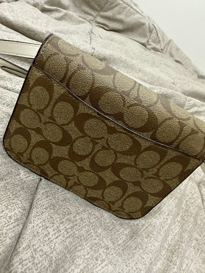 Coach Mini Brynn Khaki (Category: Luxury Bags & Wallets) located in Binan City. Submitted by resasanmig (Listing ID 1252001595, Image 2). Description: Good condition Tarnish on the lock bcoz of the friction Minimal flaws on the side with tag and care card Rfs : need funds ; hindi nagagamit.