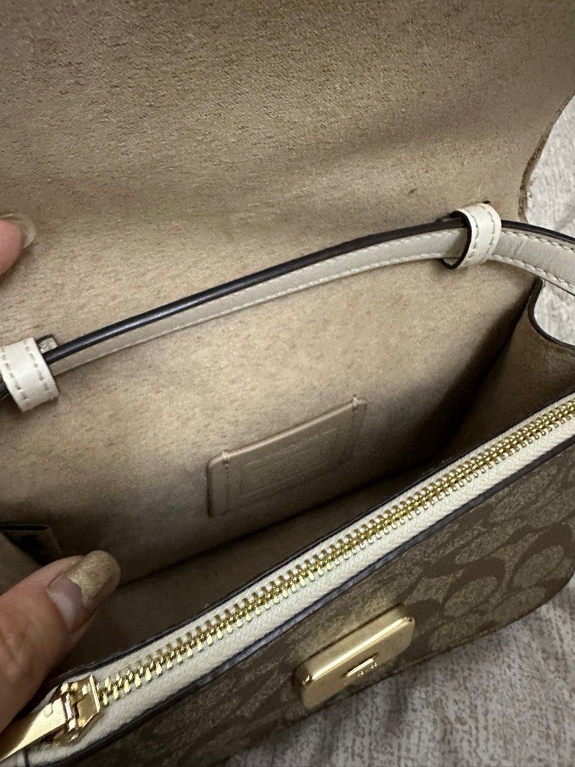 Coach Mini Brynn Khaki (Category: Luxury Bags & Wallets) located in Binan City. Submitted by resasanmig (Listing ID 1252001595, Image 3). Description: Good condition Tarnish on the lock bcoz of the friction Minimal flaws on the side with tag and care card Rfs : need funds ; hindi nagagamit.