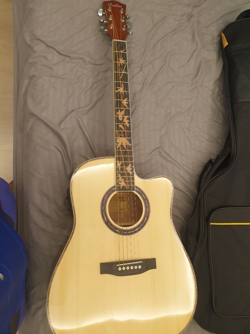 Cranberries SQOE acoustic electric guitar. on Carousell