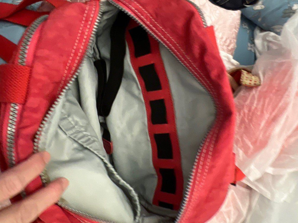 Kipling (Category: Cross-body Bags) located in Singapore. Submitted by kiwidoggy (Listing ID 1251969520, Image 3). Description: Red Kipling bag with compartments .
