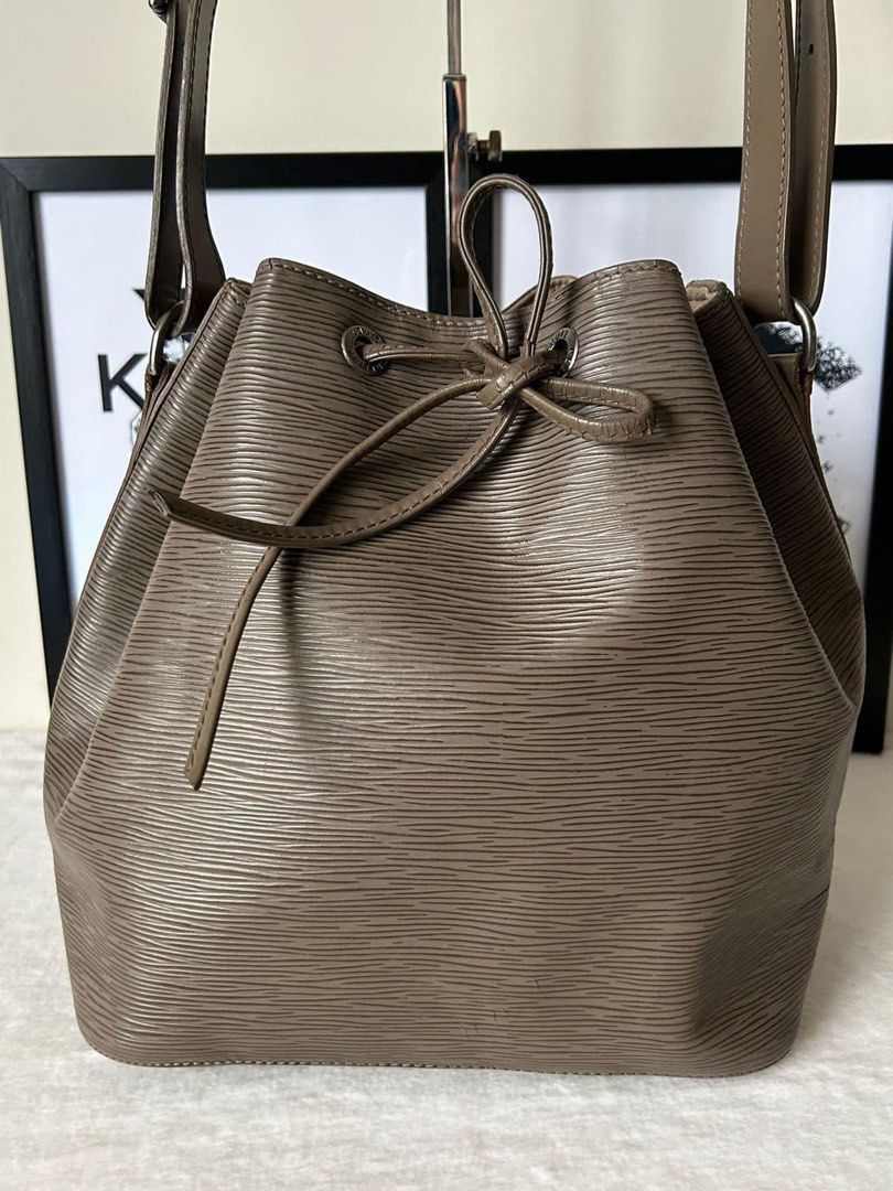 Louis Vuitton Epi Petit Noe Shoulder Bag (Category: Luxury Bags & Wallets) located in Manila. Submitted by bagislifeshop (Listing ID 1251996868, Image 2). Description: ☑️Available in Pampanga ✅Date code: AR1020 ✅Condition: 8/10 ✅Material: Epi leather ✅Colour: Taupe ✅Inclusions: Replacement dustbag .