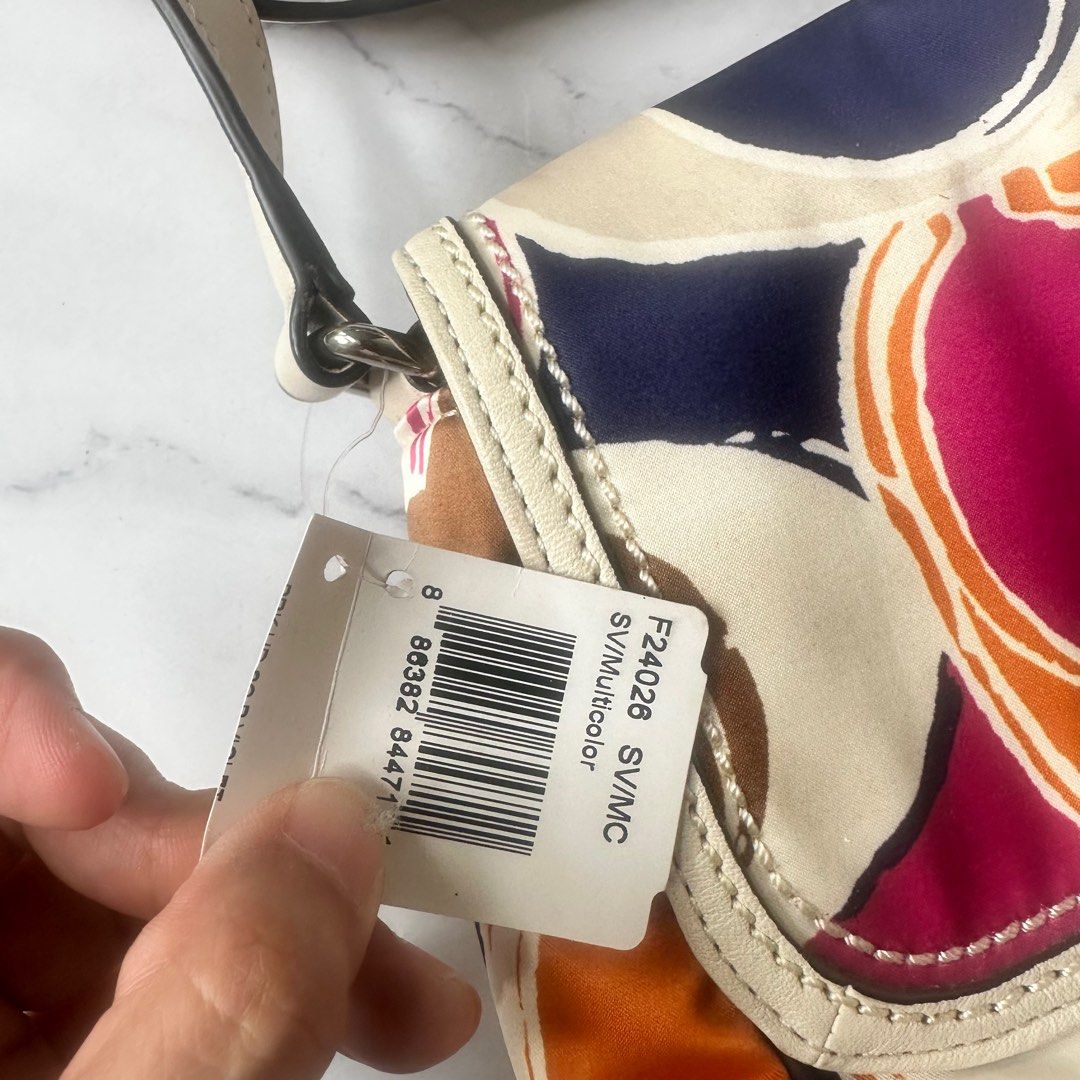 Original Coach crossbody bag (Category: Luxury Bags & Wallets) located in Quezon City. Submitted by StopNShop (Listing ID 1251894199, Image 3). Description: Brand new never used just stored With obvious minimal sign of storage (you can check 5th photo) With care card, tag and serial number.