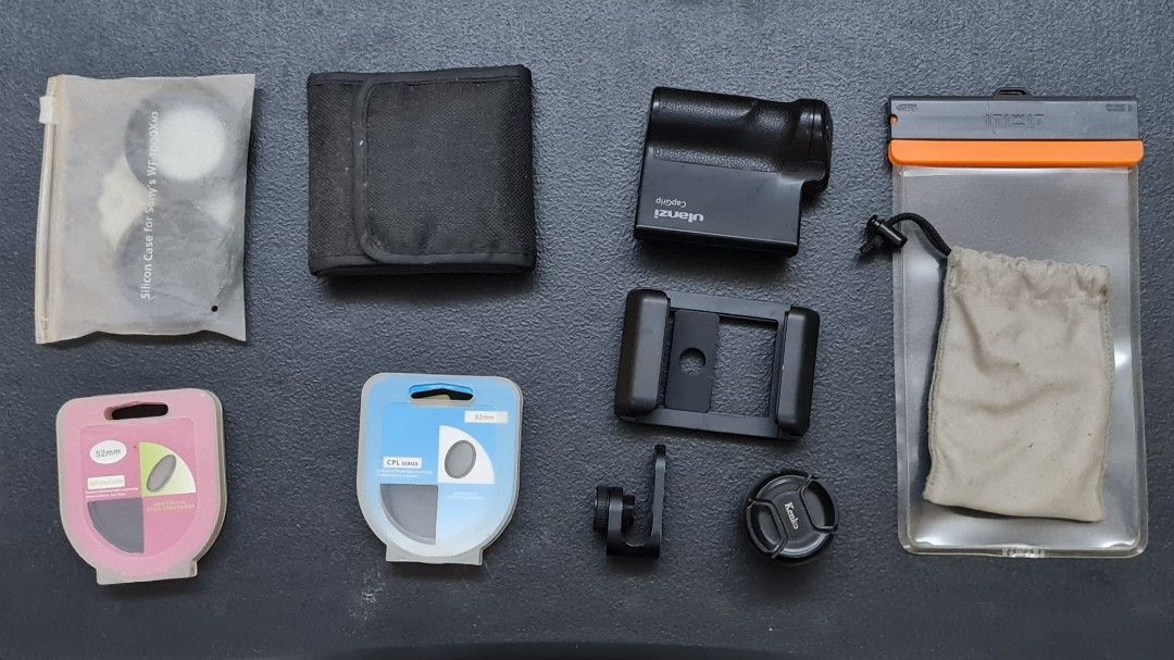 Phone Photography Accessories (Category: Lens & Kits) located in Pasig City. Submitted by mrcptdrprof (Listing ID 1251840173, Image 1). Description: only sold as a set Kenko HD 2X Tele lens Ulanzi wireless grip & trigger Ulanzi 17mm lens thread CPL Filter 52mm Variable ND Filter 52mm a bunch of magnifying filters i'll throw in the waterproof bag too.