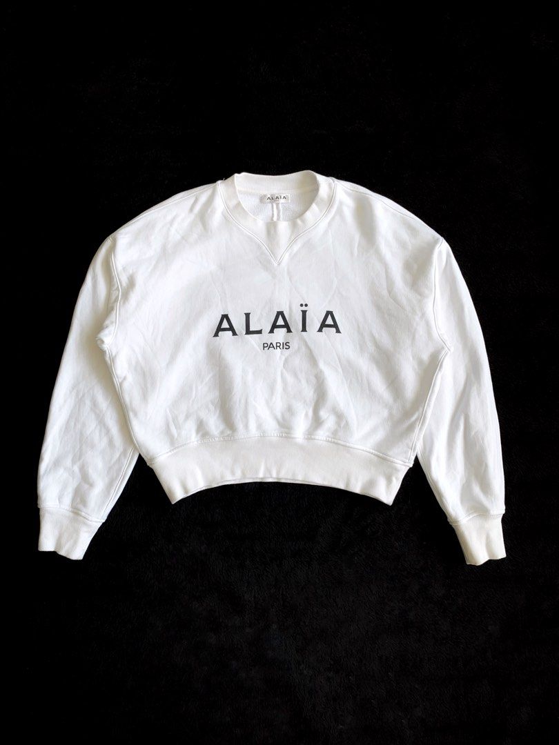 ALAIA LOGO CROPPED SWEATER, Women's Fashion, Coats, Jackets and Outerwear  on Carousell