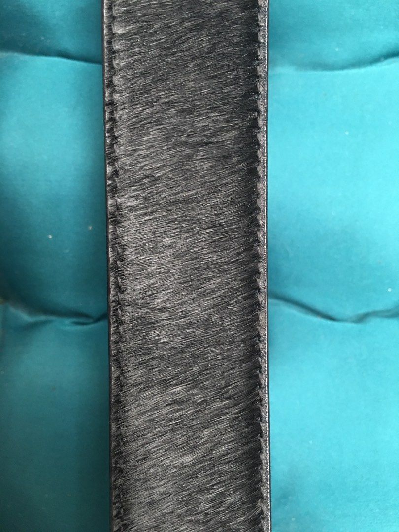 Authentic Calvin Klein Belt (Category: Luxury Accessories) located in Paranaque City. Submitted by jd555 (Listing ID 1249878051, Image 3). Description: Calvin Klein Belt Unisex Authentic Preowned In Good used condition Material: Animal Pony hair Color: Black Size: Width 1 1/4” Length- 1st hole 29 1/2” Last hole 33 1/2” Flaw: some flaking on the inside leather but is not visible in front and does not affect the beauty of the belt Sold as is No inc