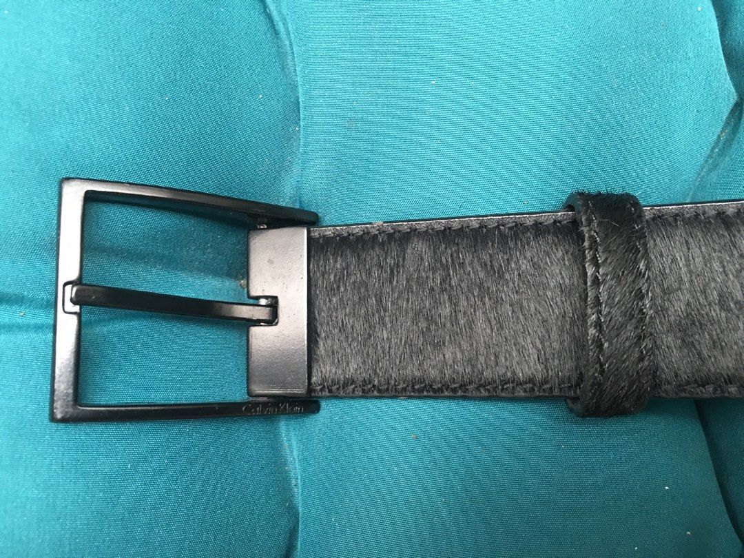 Authentic Calvin Klein Belt (Category: Luxury Accessories) located in Paranaque City. Submitted by jd555 (Listing ID 1249878051, Image 2). Description: Calvin Klein Belt Unisex Authentic Preowned In Good used condition Material: Animal Pony hair Color: Black Size: Width 1 1/4” Length- 1st hole 29 1/2” Last hole 33 1/2” Flaw: some flaking on the inside leather but is not visible in front and does not affect the beauty of the belt Sold as is No inc