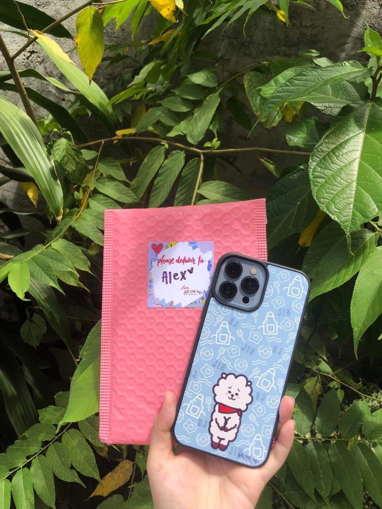IPHONE 13 PRO MAX BTS CUSTOMIZED CASE (Category: Cases & Sleeves) located in San Pedro. Submitted by ayfseb (Listing ID 1252083693, Image 1). Description: selling my good as new BTS phone case for 13 pro max RJ case is from artcasemnl (orig price: ₱370). selling it for ₱180 na lang JK Tattoo’s and BT21 - ₱150 each take all: ₱450 rfs: phone upgrade.
