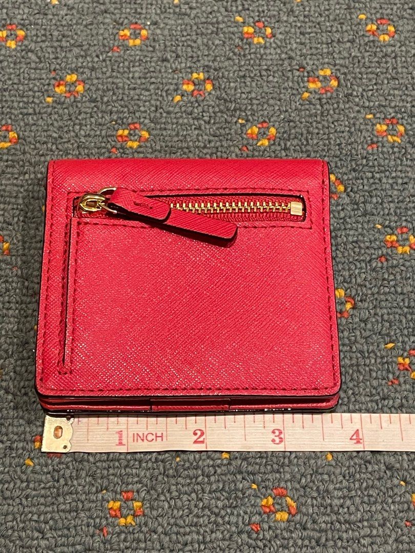 Kate Spade Wallet (Category: Luxury Bags & Wallets) located in Quezon City. Submitted by thyca (Listing ID 1252034554, Image 3). Description: Used once Size in cm 9.5 x 8 No flaws good as new.