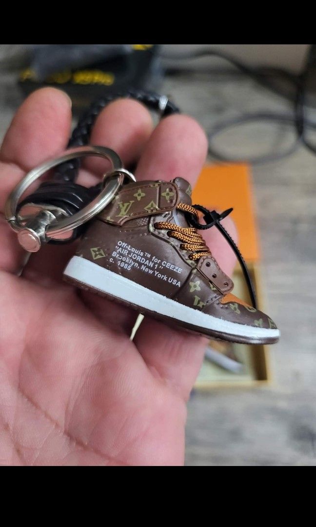 LV Lion Leather Keychain, Luxury, Accessories on Carousell