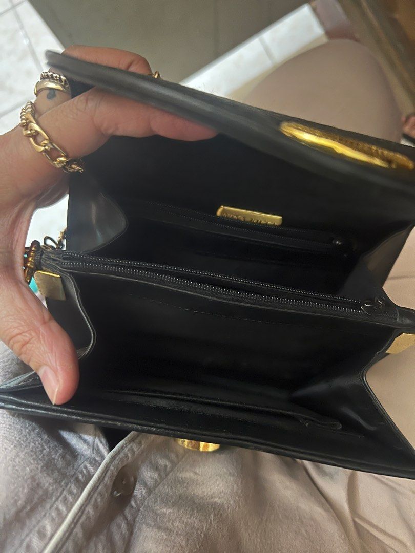 Nina Ricci party bag (Category: Luxury Bags & Wallets) located in Quezon City. Submitted by flamingo28pink (Listing ID 1252141449, Image 2). Description: Bought this online for 2k and never used it. Because walang party na aatenan. This bag is pretty gorgeous and pwede sa wedding and night party looks elegant and very handy phone and purse can fit. Bagay in any outfit lalu n kpag nka pants.