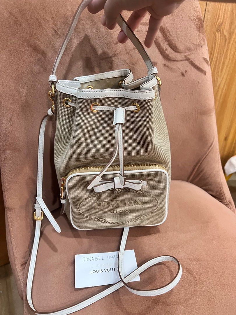 Prada Jacquard Bucket bag (Category: Luxury Bags & Wallets) located in Malolos. Submitted by humanpink77 (Listing ID 1252115075, Image 1). Description: Guaranteed Authentic 8-10 condition No inclusions Minimal rubs on corner Size Base length: 7.00 in Height: 9.25 in Width: 4.50 in Drop: 4.50 in Drop: 22.50 in.