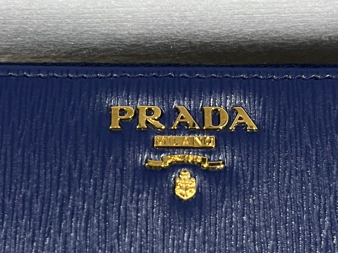 Prada wallet store fake vs real