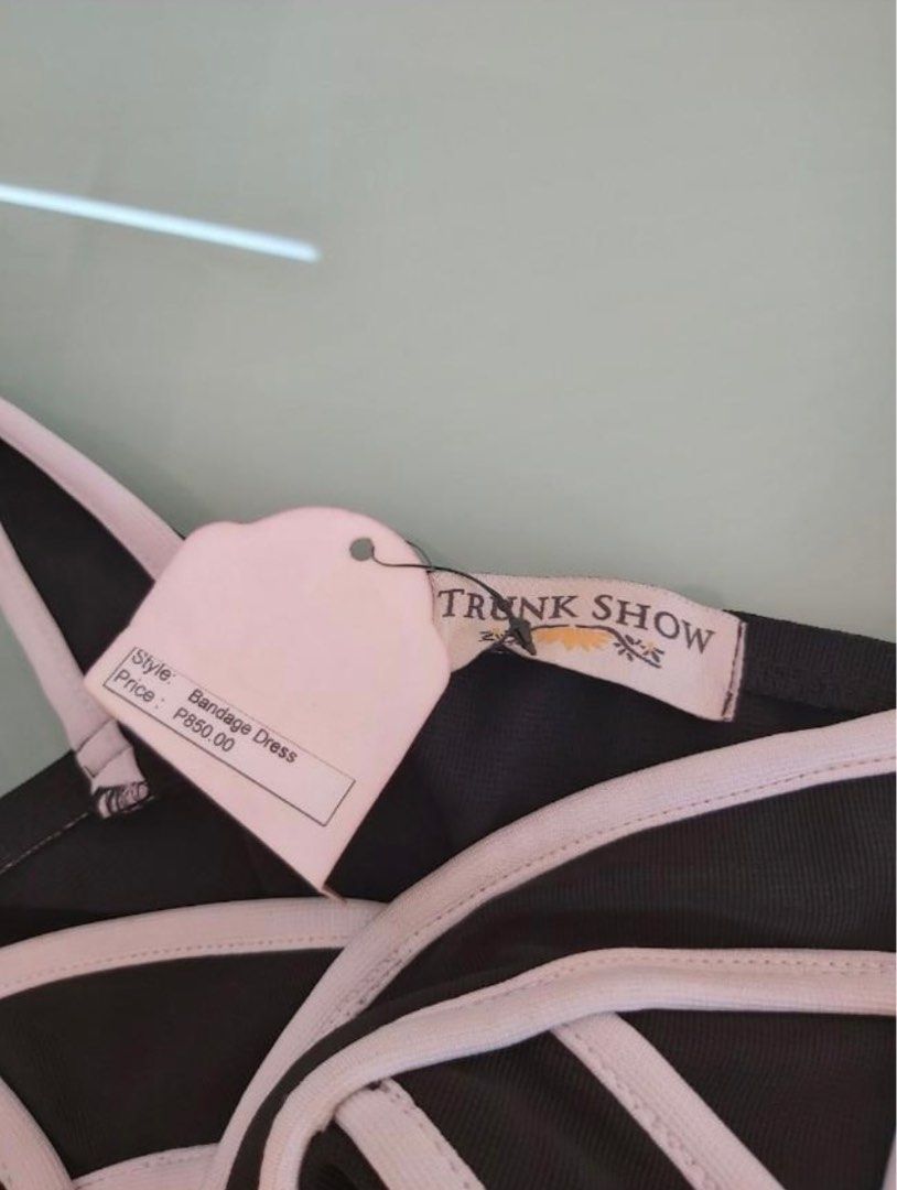Trunk Show Bandage Dress (Category: Dresses) located in Pasig City. Submitted by panavi (Listing ID 1252077903, Image 3). Description: BNWT Size: fits XS to Small Color: Black with white trimmings Very pretty in actual ₱850 on tag, Selling it for only ₱450 .