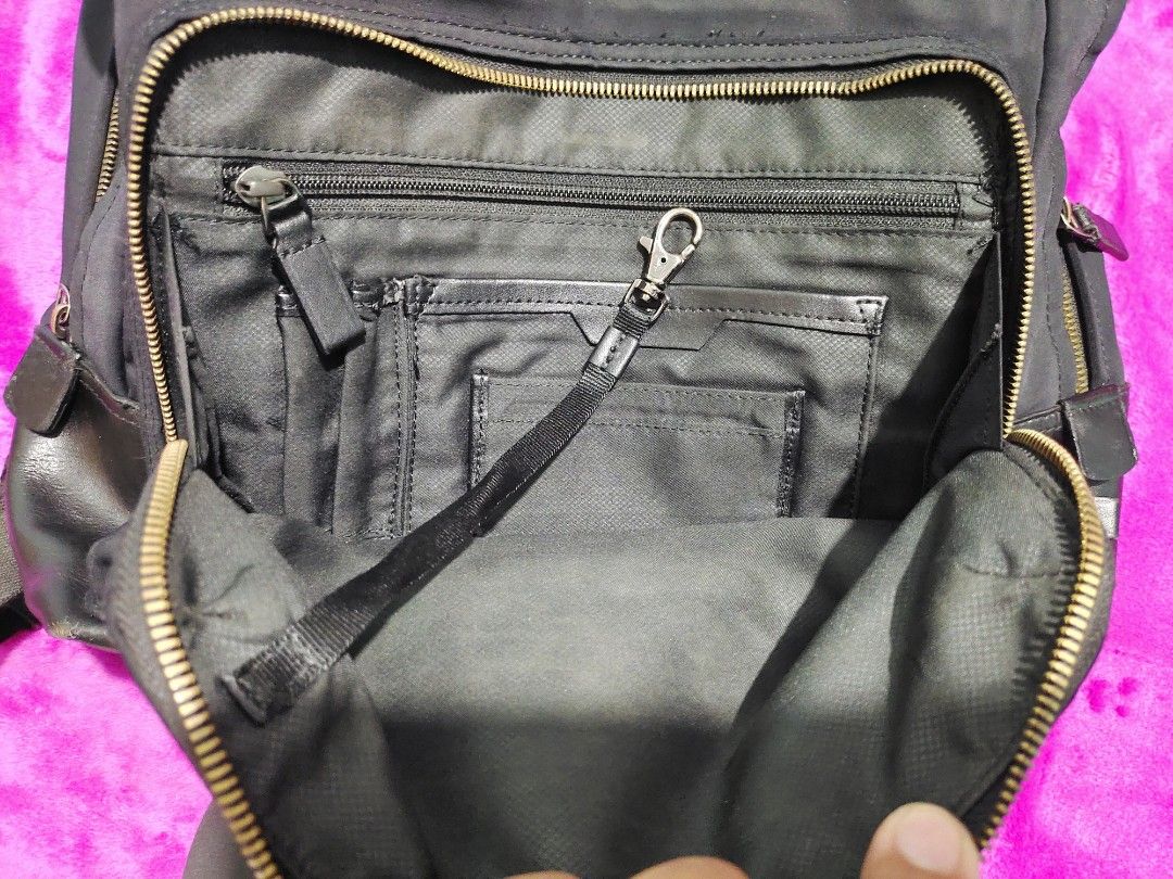 Tutilo captive backpack sales